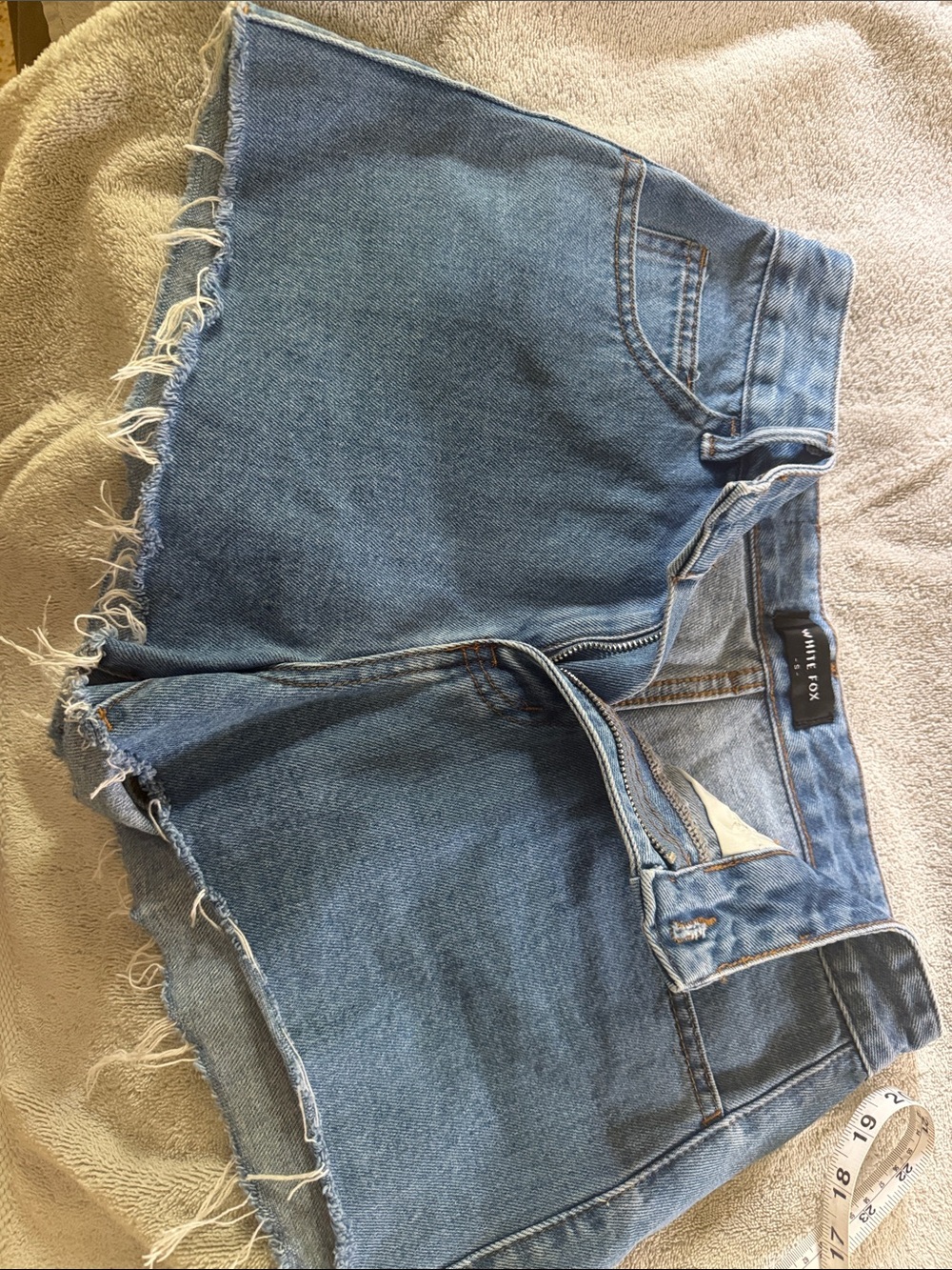 White Fox Boutique Light Blue Frayed Hem Denim Shorts